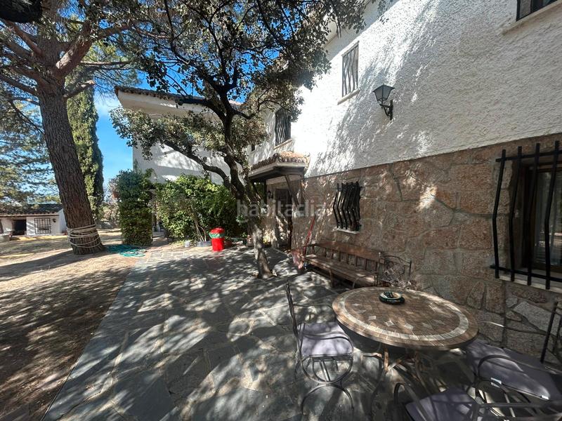 Foto 235ae82a-1906-458c-b54a-780ecabc43a1. Chalet with fireplace heating pool in La Berzosilla Torrelodones