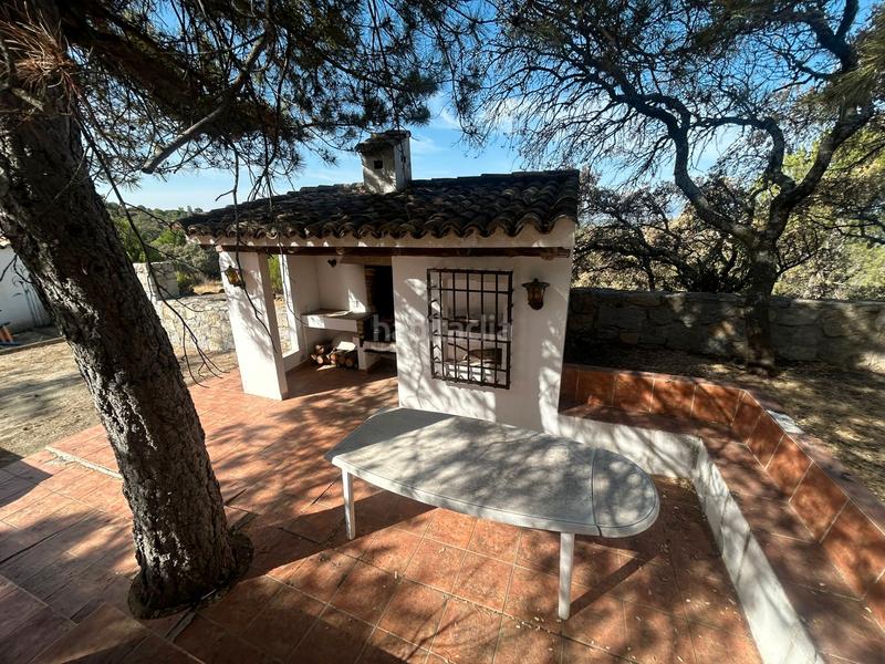 Foto 2b986576-01cc-4971-8ce6-a7aa1b4b0ca4. Chalet with fireplace heating pool in La Berzosilla Torrelodones