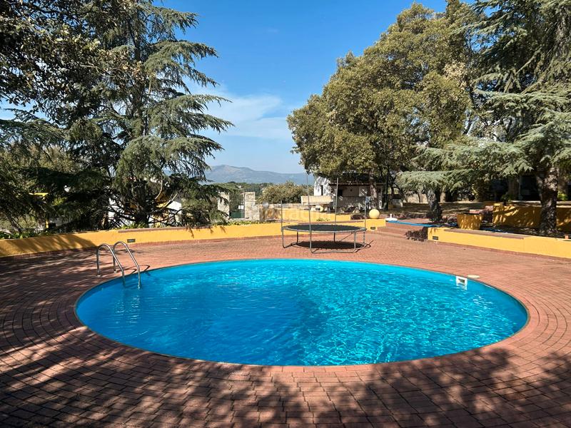 Foto 304f6ee6-f6ed-4be0-a9ef-f0b3c76f3e32. Chalet with fireplace heating pool in La Berzosilla Torrelodones