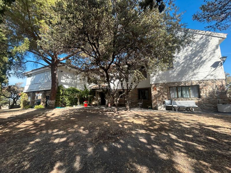 Foto 832485ce-ae03-4819-a540-b66c84f5dac8. Chalet with fireplace heating pool in La Berzosilla Torrelodones