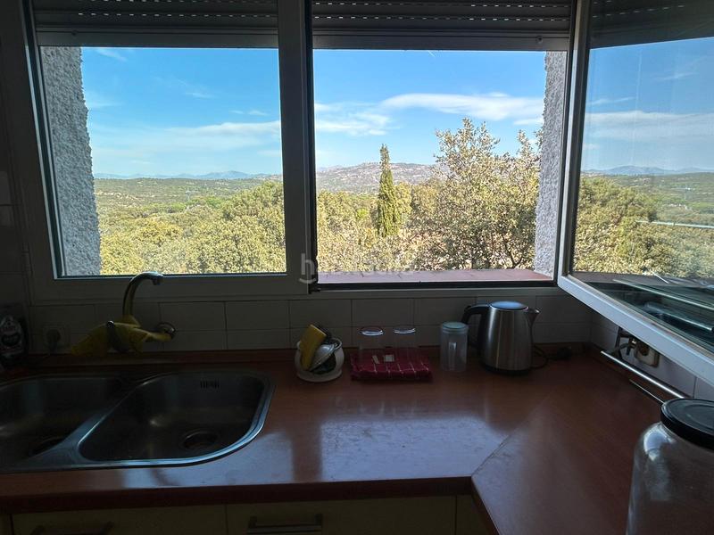 Foto 8d4999cc-56cb-4378-be16-9f3ed9fe7b76. Chalet with fireplace heating pool in La Berzosilla Torrelodones