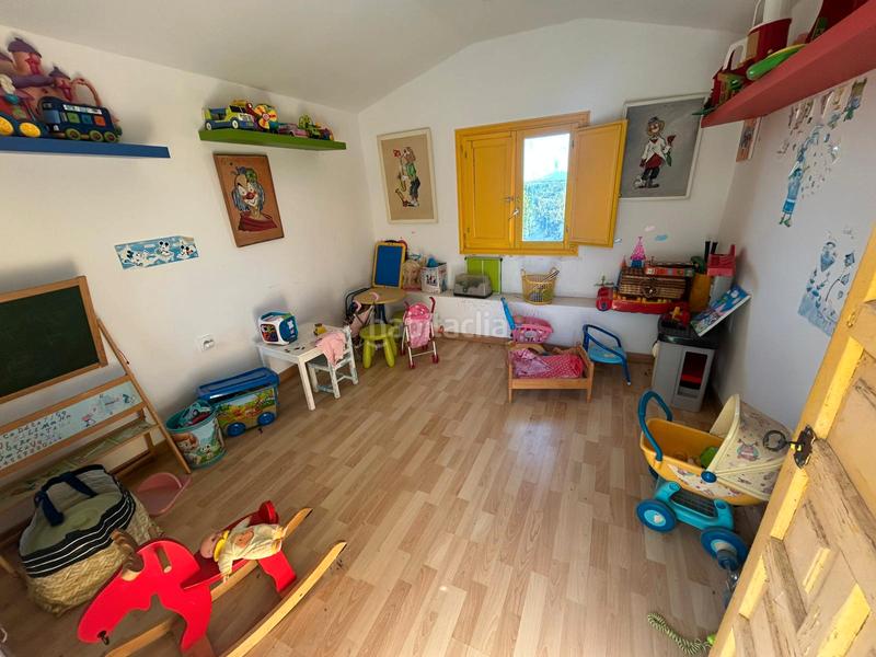 Foto 932fd92b-835f-4a8d-b655-a05db776442d. Chalet with fireplace heating pool in La Berzosilla Torrelodones