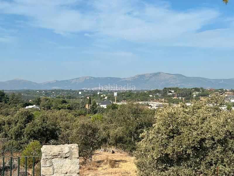 Foto b687a32d-ae05-4a5d-ae96-91511a4bceb2. Chalet with fireplace heating pool in La Berzosilla Torrelodones