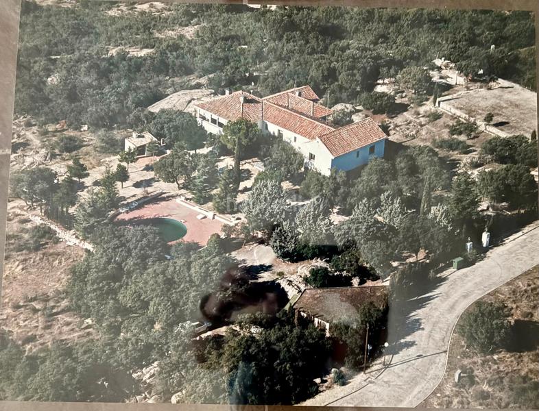 Foto b7fe2b7d-95d0-42af-9d83-8aef13d84b93. Chalet with fireplace heating pool in La Berzosilla Torrelodones