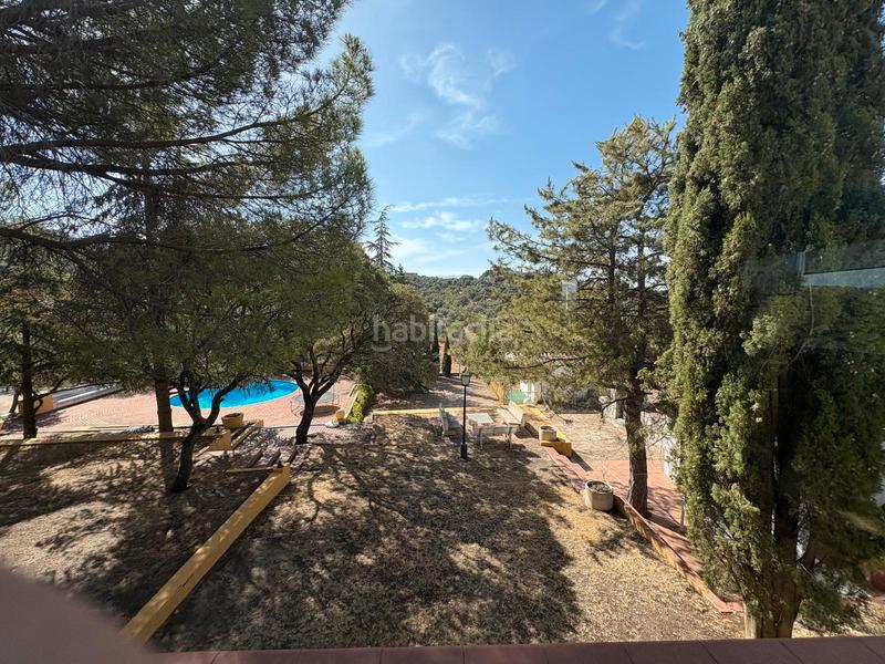 Foto bef44856-5170-4f80-b900-dcd9f3a8f5c8. Chalet with fireplace heating pool in La Berzosilla Torrelodones