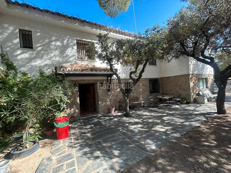 Foto cc6fd0d1-571e-4930-9c93-9e3b6bca40ee. Chalet with fireplace heating pool in La Berzosilla Torrelodones