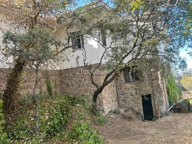 Foto ecd3a28b-bd21-42ea-8eb2-af2ba9e2033d. Chalet with fireplace heating pool in La Berzosilla Torrelodones