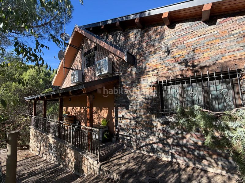 Foto 0e5b77f6-b42b-41dd-80a2-77924b0bc6cb. Chalet mit kamin heizung parking pool in Valdemaqueda