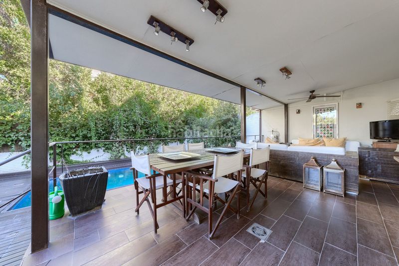 Foto c6fa0d55-e337-4e51-a1b3-d684fd53b411. Casa adossada amb calefacció aparcament piscina a Pozuelo de Alarcón
