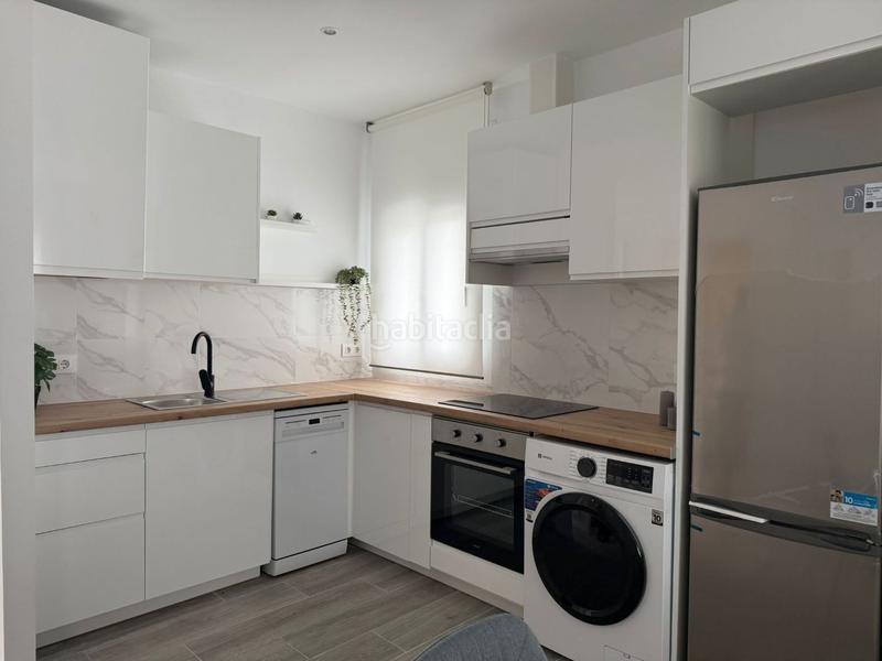 Foto f0320784-02a3-4686-8d31-db173cb8343e. Apartamento  en venta con piscina y jardín comunitario y plaza de aparcamiento . en Empuriabrava