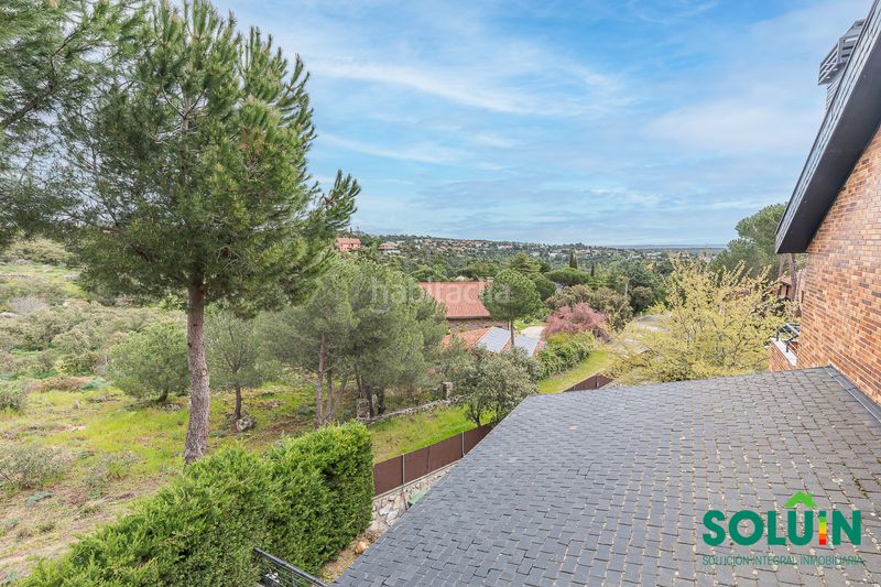 Foto 7cbb56ad-f8d1-4bf2-97d6-d14a6b74ff68. Casa amb xemeneia calefacció aparcament piscina a Torrelodones