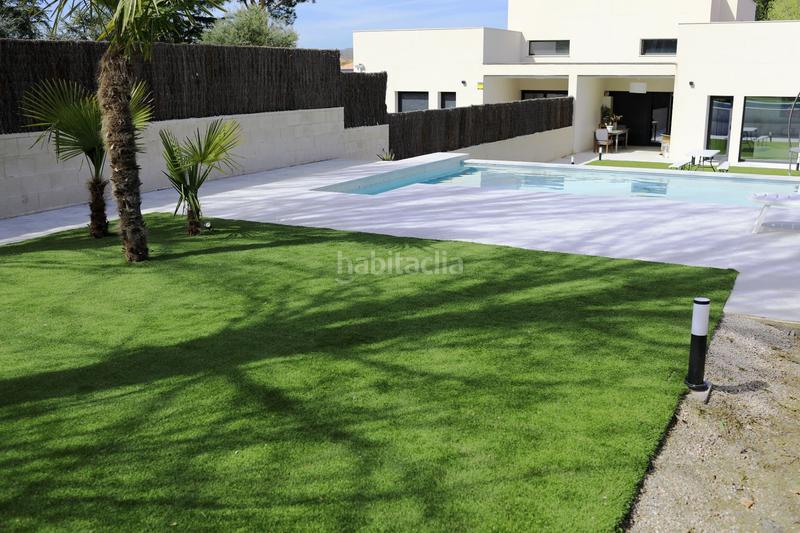 Foto b53ebe72-e665-45bc-a706-39011a22b8c3. Casa adossada amb calefacció piscina a Quijorna