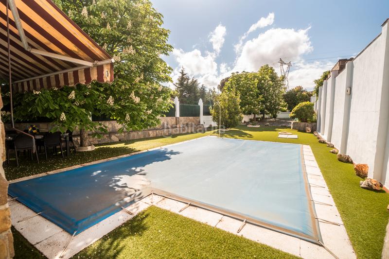 Foto d8fa2c72-7e37-4155-821c-961e0404c217. Chalet mit heizung parking pool in San Martín de la Vega