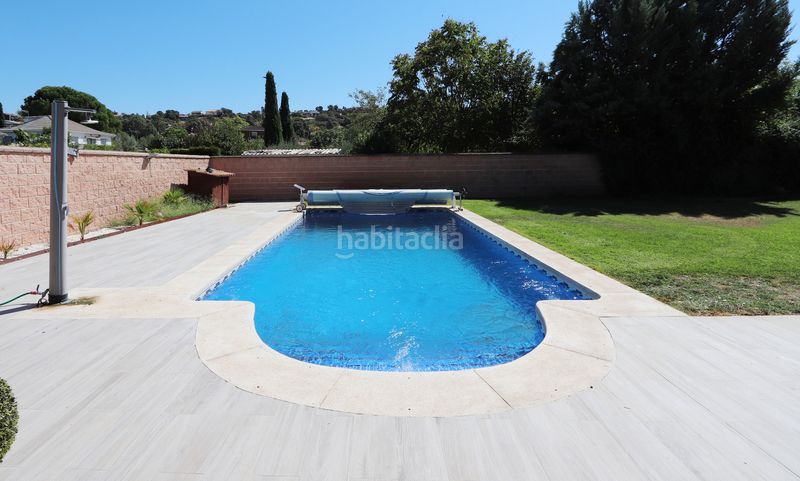 Foto 4057aa17-6802-4d41-957d-1b1e7c1cc720. Chalet avec cheminée chauffage parking piscine dans Calalberche