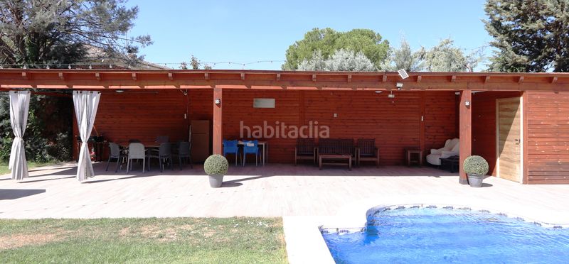 Foto 7b44f89c-91dc-4d0d-95cd-e26f1c18514c. Chalet avec cheminée chauffage parking piscine dans Calalberche