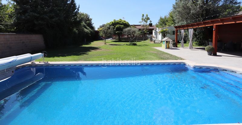 Foto 8813cb6c-b093-4f82-82ea-f6c9622545ea. Chalet avec cheminée chauffage parking piscine dans Calalberche
