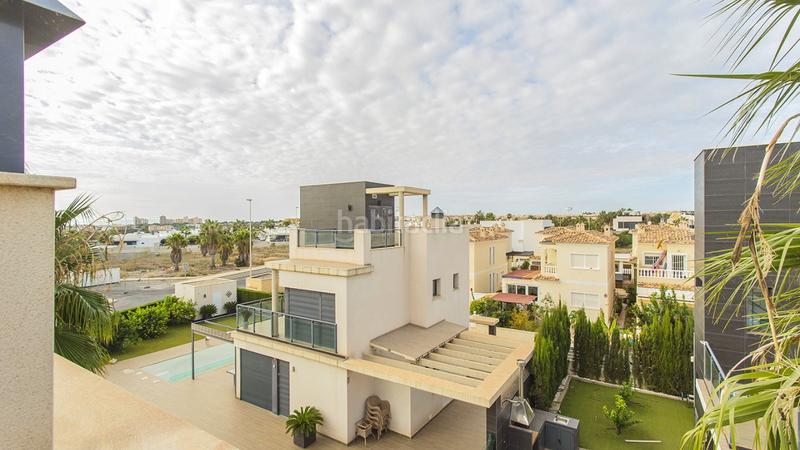 Foto d1126882-5346-47d9-9068-904118949060. Casa con riscaldamento parcheggio piscina in Lomas de Cabo Roig - Los Dolses Orihuela