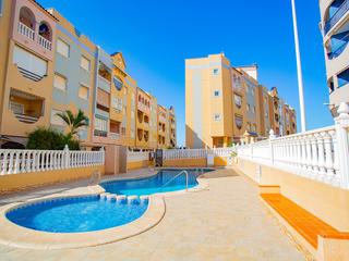 Apartamento en Gaspar Perelló. Apartamento con piscina comunitaria junto a la playa de la mata,