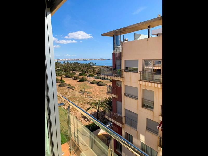 Foto 3f678e7e-e982-486e-b4eb-67de81ee6c06. Attico con riscaldamento parcheggio piscina in Punta Prima Torrevieja