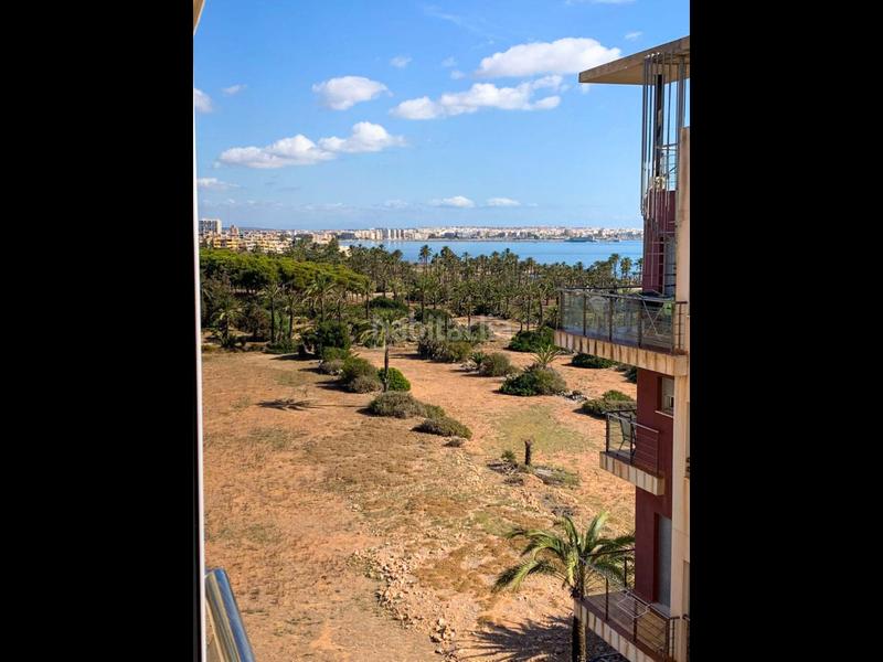 Foto d040a4e0-cd99-4cb6-9cf2-5cfbbbe2bf05. Attico con riscaldamento parcheggio piscina in Punta Prima Torrevieja