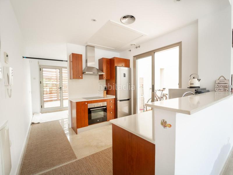 Foto 49b7c3fc-cede-404d-a6c4-fa08ed8978c3. Maison avec chauffage parking piscine dans Punta Prima Torrevieja