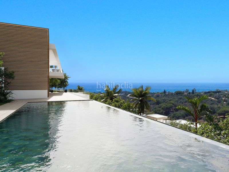 Foto 5606b850-aeb5-40ed-822c-aeaea66b2dd9. Chalet esta villa exclusiva en Elviria combina arquitectura moderna con un entorno natural privilegiado, ofreciendo vistas despejadas al en Marbella