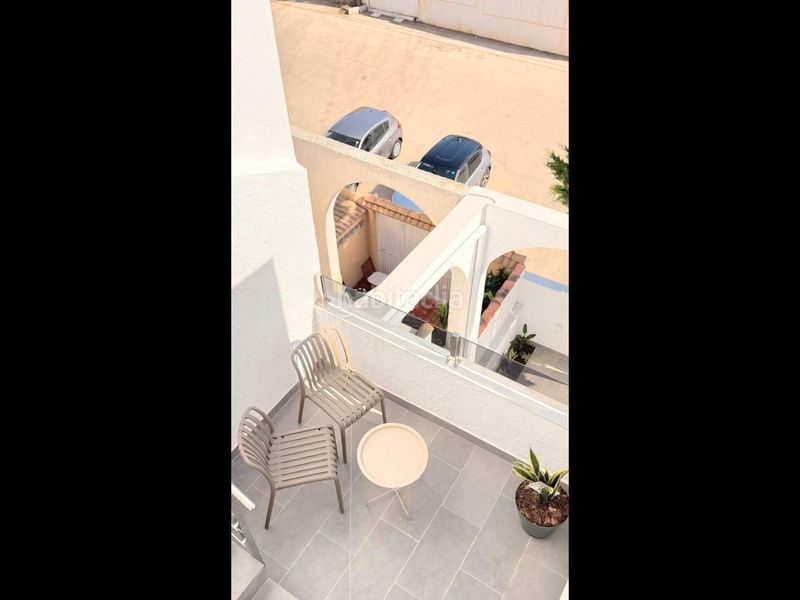 Foto bf9b46ac-496d-4e59-80d8-089e1afee0fc. Casa adossada amb calefacció piscina a nueva Torrevieja Torrevieja