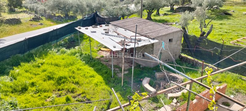Foto e900763a-52a3-41eb-8a42-1068ddc07721. Casa amb xemeneia aparcament a Cenicientos