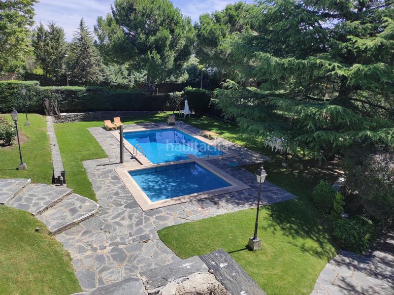 Foto ac602d57-9f3a-414d-8bee-b7defe269f27. Chalet con camino riscaldamento parcheggio piscina in Torrelodones