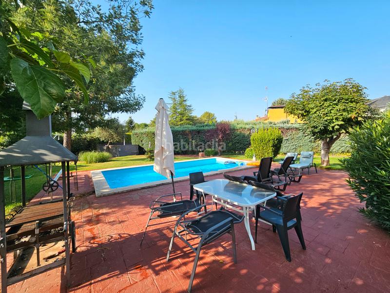 Foto e2cc9fcf-d986-4740-aede-ddd67a985d35. Chalet con camino riscaldamento parcheggio piscina in Alpedrete