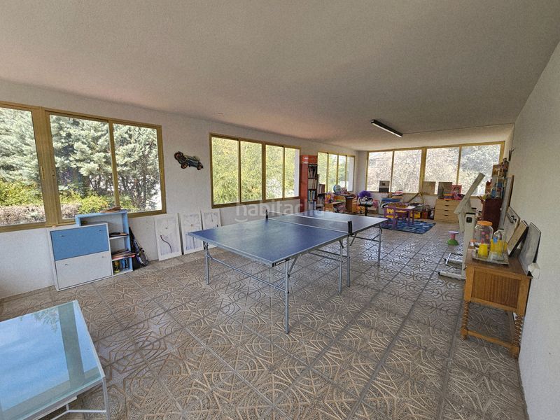 Foto 1960c9ad-fdf5-49bb-b4ac-cd955f761840. Chalet with fireplace heating parking pool in Alpedrete