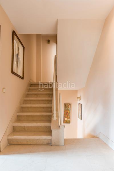 Foto 0e70a0f0-19c6-4d19-9e7f-8e1e5597afb8. Casa aparellada amb piscina a Pueblo Pozuelo de Alarcón