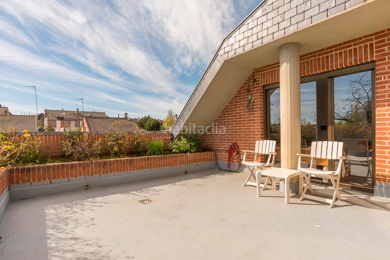 Foto e39c74f1-23d1-4b45-9694-3b5dfa5ae538. Casa aparellada amb piscina a Pueblo Pozuelo de Alarcón