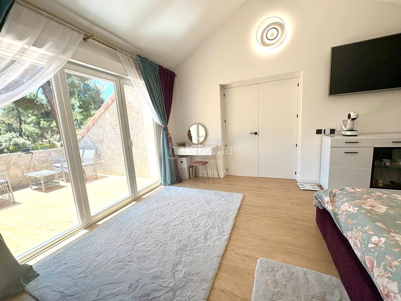 Foto e661b28e-1ee6-4ba9-b9b9-3f2154df2754. Chalet dans calle de los nardos 301 dans Marugán