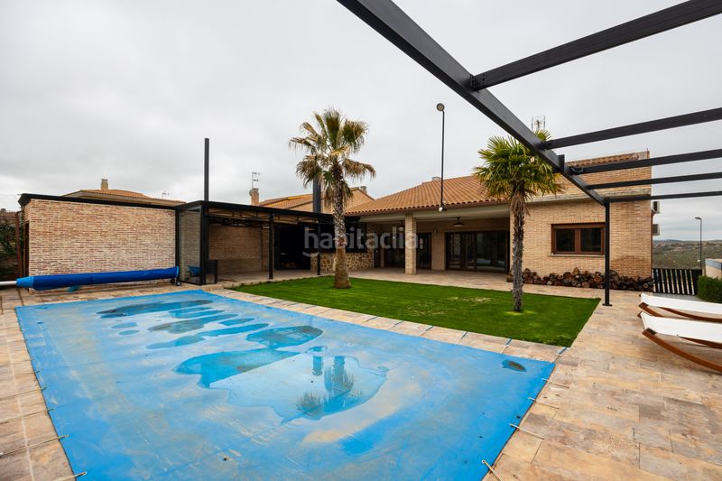 Foto c221ab06-2f74-4b23-bb84-42ee505a2405. Xalet amb calefacció aparcament piscina a Layos
