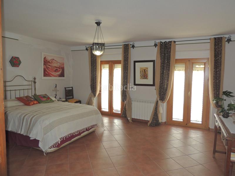 Foto 737aa52e-572b-485b-8eea-d64aa7bee603. Casa adossada a Yunquera de Henares