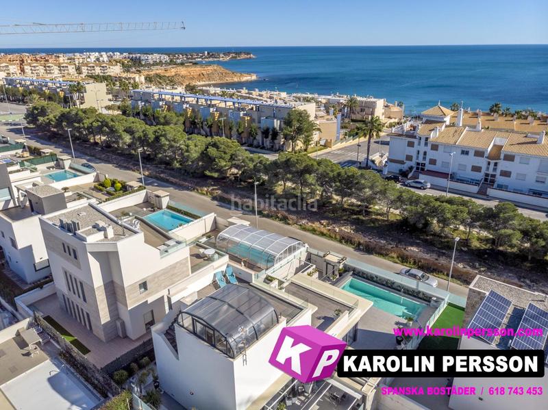 Foto dc2fe370-f628-4616-80fa-e2c3ca76bfa1. Maison avec piscine dans Campoamor Orihuela