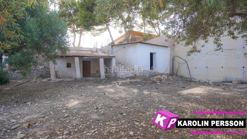 Foto bedc1dfc-08ef-41f1-926d-574ce2bd7e2c. Casa con parcheggio in Peña de las Águilas Elche / Elx