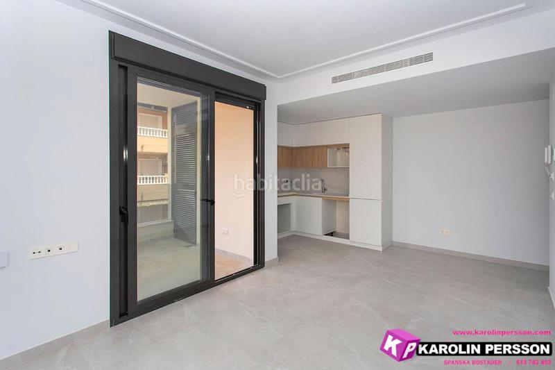 Foto 02cda5f8-52c9-49f3-9036-0a5ff0693c99. Flat with pool in Las Piscinas Naturales Torrevieja