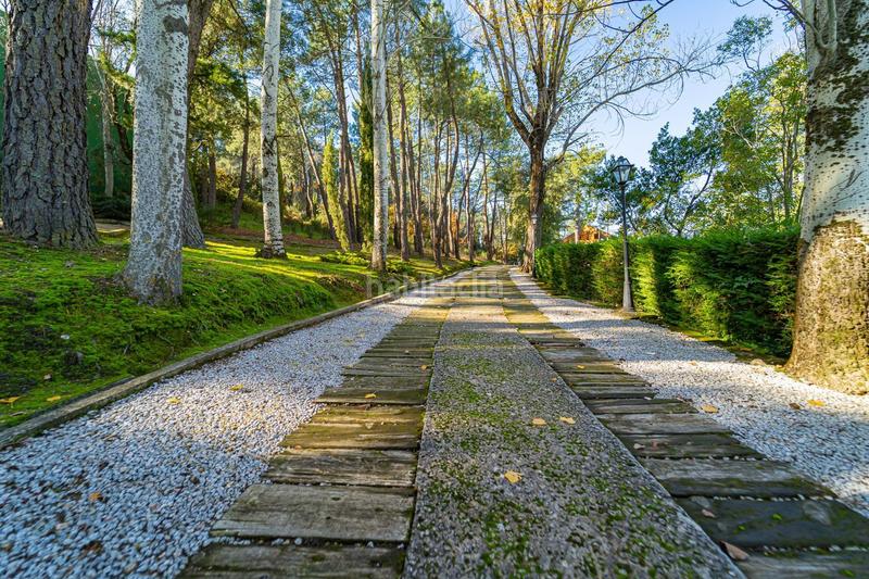 Foto cbc68692-0a96-4154-8d9d-506e3f78fb47. Masia amb calefacció piscina a Guadarrama