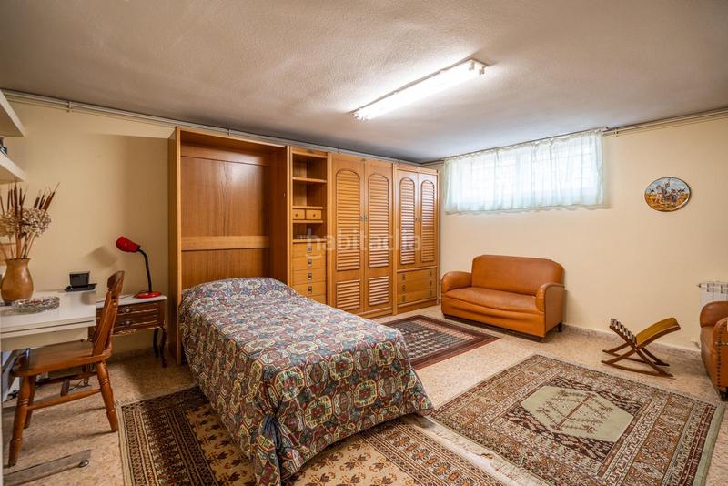 Foto 11b779a6-06ce-4115-bb8c-14e70e5e8953. Casa aparellada amb calefacció aparcament a Peñagrande Madrid