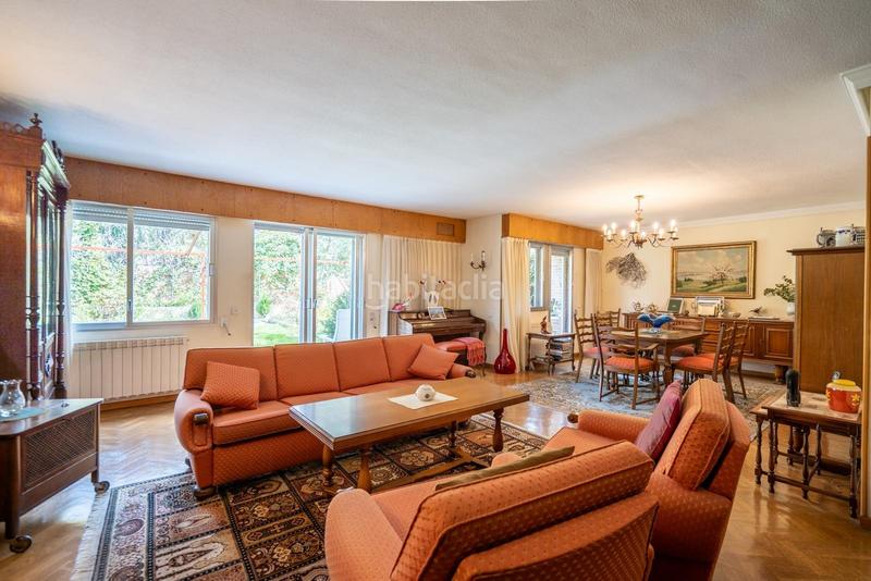 Foto 1e1cfae6-60b1-4146-81b8-a3d62c0edeac. Casa aparellada amb calefacció aparcament a Peñagrande Madrid