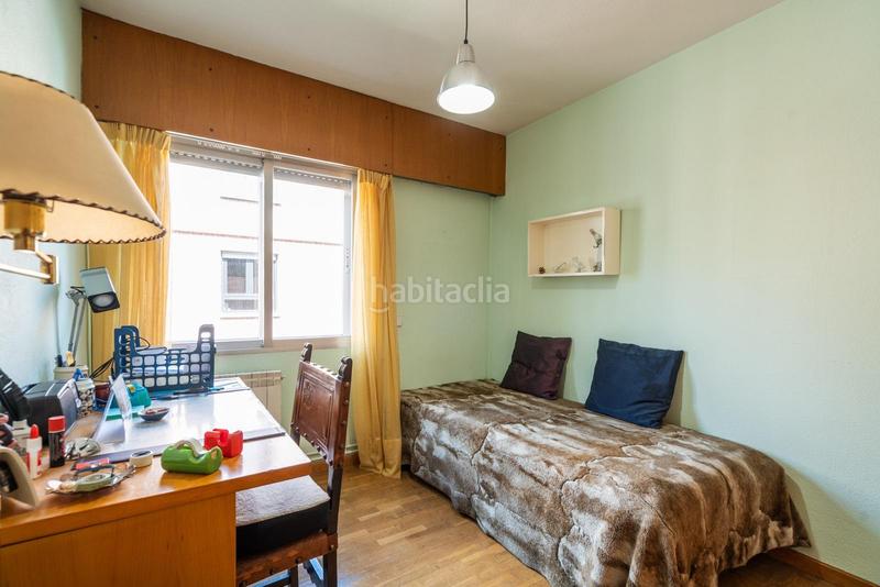 Foto 477f334c-22e8-43b4-ae17-73d54266a74c. Casa aparellada amb calefacció aparcament a Peñagrande Madrid