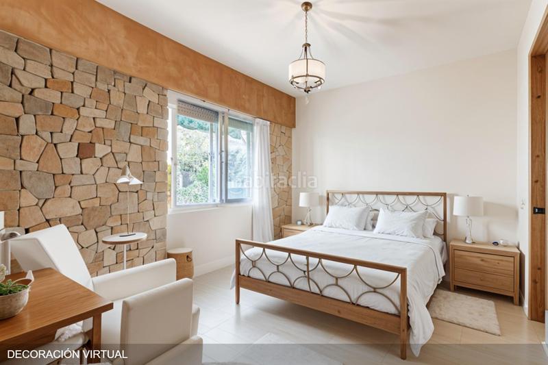 Foto 520235d9-07dc-43f4-85fd-73e1e6d4750f. Casa aparellada amb calefacció aparcament a Peñagrande Madrid