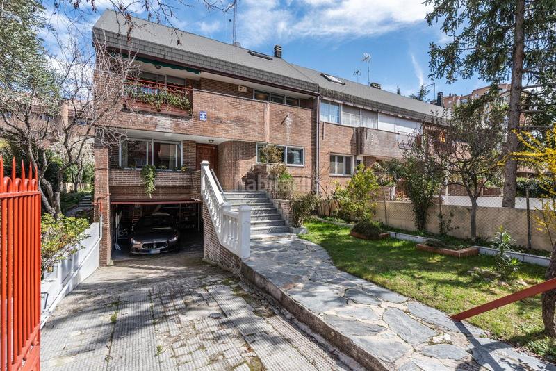 Foto 7591be6c-c205-4a1d-bd2f-689471035acb. Casa aparellada amb calefacció aparcament a Peñagrande Madrid