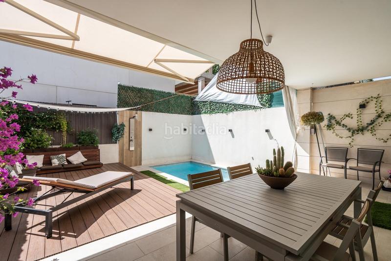 Foto dc28d0cf-8d07-46c8-9368-f4790ec27db8. Maison jumelée avec parking piscine dans Valdebebas - Valdefuentes Madrid