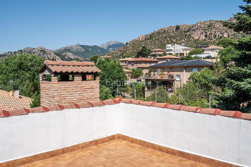Foto 693ec1b1-aa06-4f7e-a191-ba8ad51ba9ea. Chalet bonito chalet independiente con parcela de 839 m se ofrece este atractivo chalet individual de tres plantas en Manzanares el Real