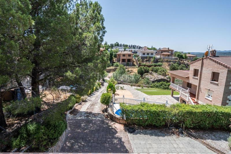 Foto bd49d3e1-2d19-4102-bdab-a08fe3c8000c. Chalet con riscaldamento parcheggio in Manzanares el Real