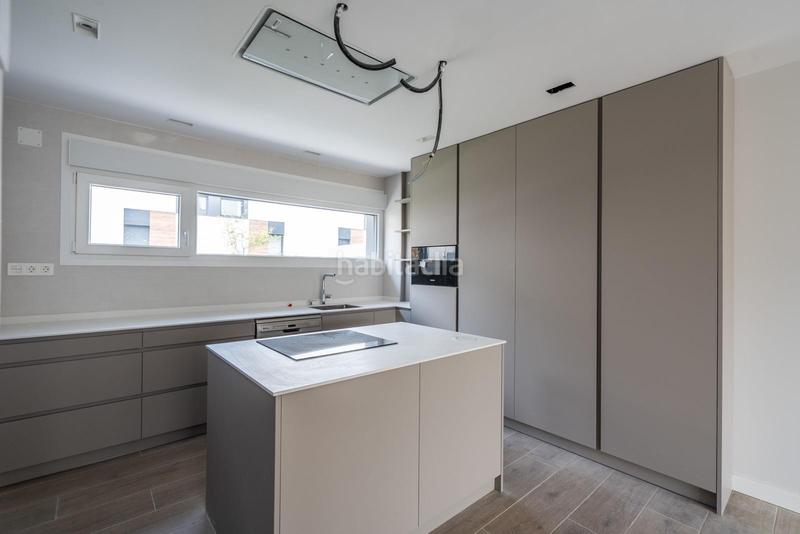 Foto 724c74ad-b6cd-4c72-aa8b-5ddd13a66b46. Casa adossada amb calefacció aparcament piscina a Rozas de Madrid (Las)