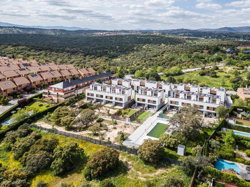 Foto 77e3d226-4fe8-4a61-a5ee-478f8650647e. Casa adossada amb calefacció aparcament piscina a Rozas de Madrid (Las)